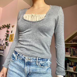 grey long sleeve blouse with puffy chest detail